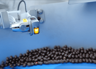 Chocolate balls into machine image